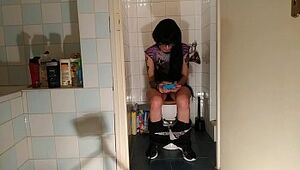 Spectacular goth teen pee & s. while play with her phone pt2 HD